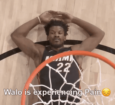 A Basketball Player With The Number 22 On His Jersey Laying On The Floor GIF