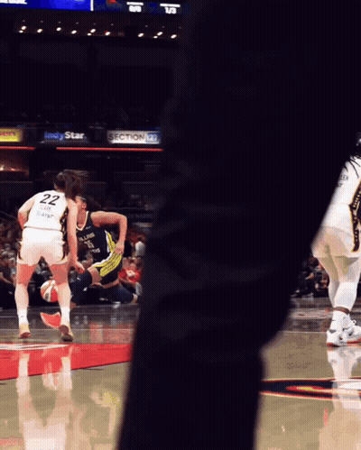A Basketball Player With The Number 22 On The Back Of Her Jersey GIF