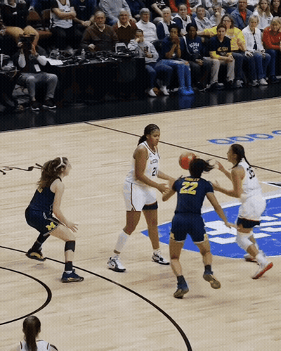A Basketball Player With The Number 22 On The Back Of Her Shorts GIF