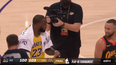 A Basketball Player With The Number 23 On His Jersey Is Being Filmed GIF