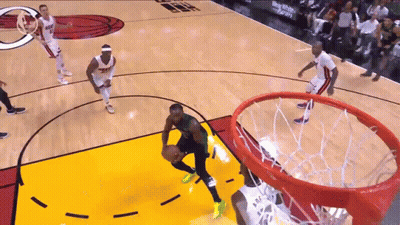 A Basketball Player With The Number 23 On The Back Of His Shirt GIF