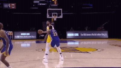 A Basketball Player With The Number 23 On The Back Of His Shorts GIF