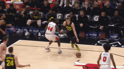 A Basketball Player With The Number 24 On His Back GIF