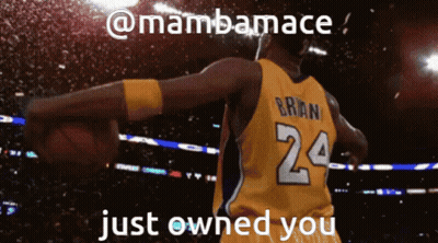 A Basketball Player With The Number 24 On His Jersey Is Holding A Basketball GIF