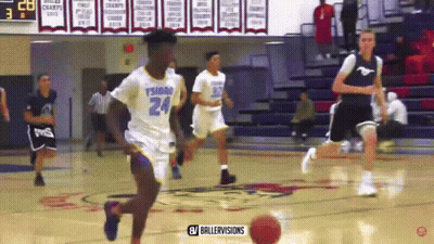 A Basketball Player With The Number 24 On His Jersey Is Running Toward The Ball GIF