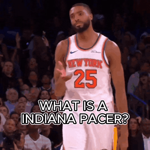 A Basketball Player With The Number 25 On His Jersey Stands In Front Of A Crowd GIF