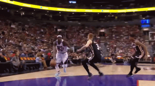 A Basketball Player With The Number 3 On His Back GIF