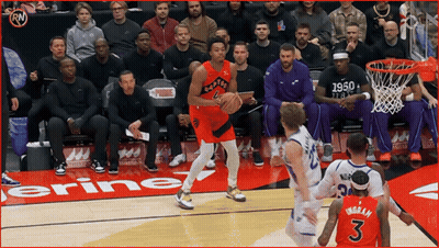 A Basketball Player With The Number 3 On His Jersey Dribbles The Ball GIF