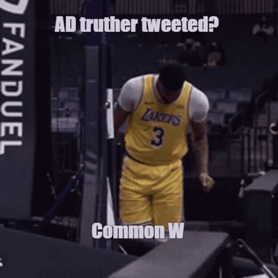 A Basketball Player With The Number 3 On His Jersey Stands In A Locker Room GIF