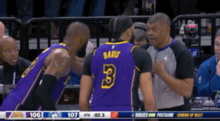 A Basketball Player With The Number 3 On His Jersey Talks To Another Player GIF