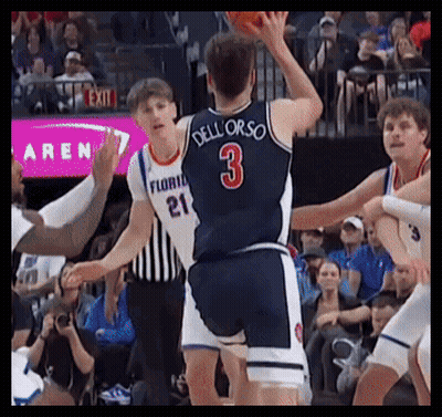 A Basketball Player With The Number 3 On His Jersey Throws The Ball GIF
