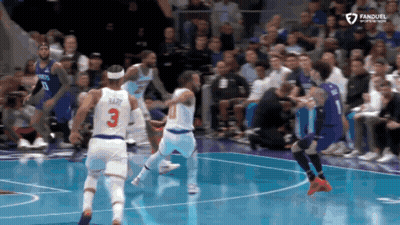 A Basketball Player With The Number 3 On The Back Of His Shirt GIF