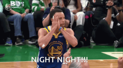 A Basketball Player With The Number 30 On His Jersey Covers His Face With His Hands GIF