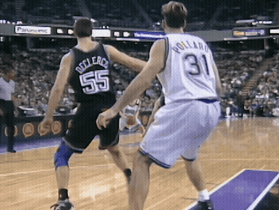 A Basketball Player With The Number 31 On His Back Is Playing Against A Player With The Number 55 On His Back GIF