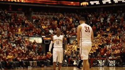 A Basketball Player With The Number 31 On His Jersey Stands Next To Another Player GIF