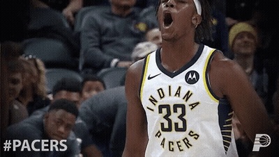 A Basketball Player With The Number 33 On His Jersey Is Screaming GIF