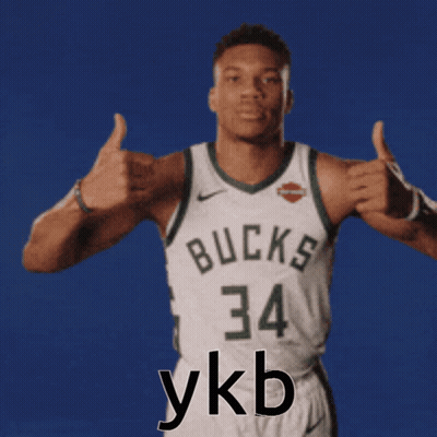 A Basketball Player With The Number 34 On His Jersey Gives Two Thumbs Up GIF