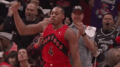 A Basketball Player With The Number 4 On His Jersey Is Celebrating GIF