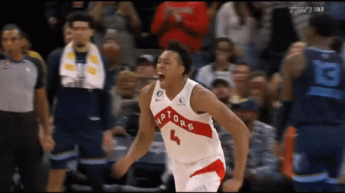 A Basketball Player With The Number 4 On His Jersey Is Celebrating GIF
