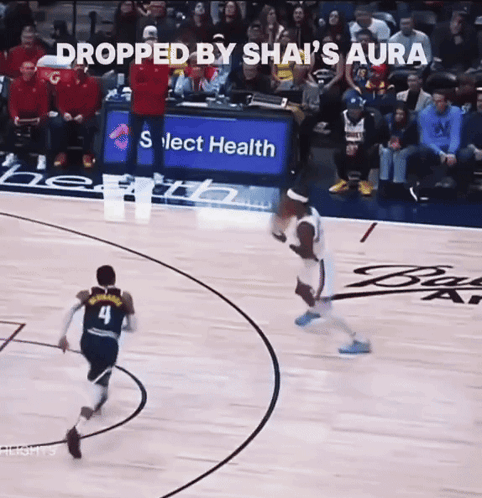 A Basketball Player With The Number 4 On His Jersey Is Dribbling The Ball GIF