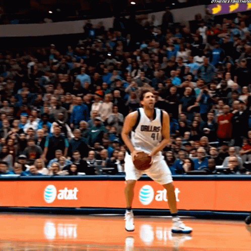 A Basketball Player With The Number 41 On His Jersey Stands On The Court GIF