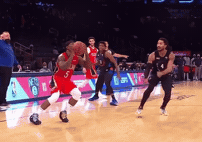 A Basketball Player With The Number 5 On His Jersey Is Dribbling A Ball GIF