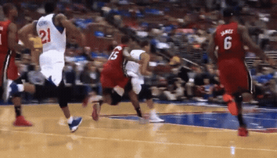A Basketball Player With The Number 6 On His Jersey Is Dribbling The Ball GIF