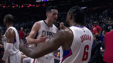A Basketball Player With The Number 6 On His Jersey Is Hugging Another Player GIF