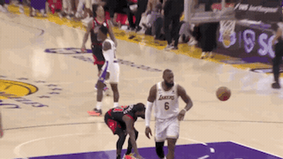 A Basketball Player With The Number 6 On His Shorts Dribbles The Ball GIF