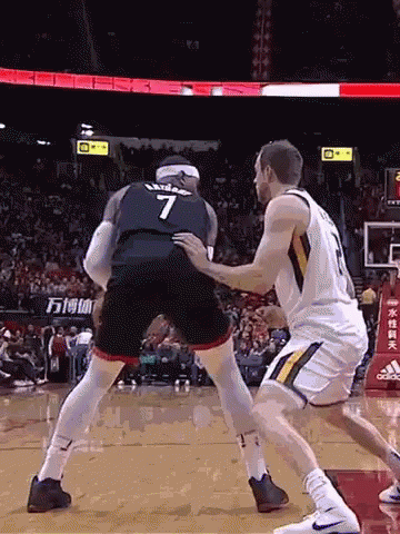 A Basketball Player With The Number 7 On The Back Of His Shirt GIF