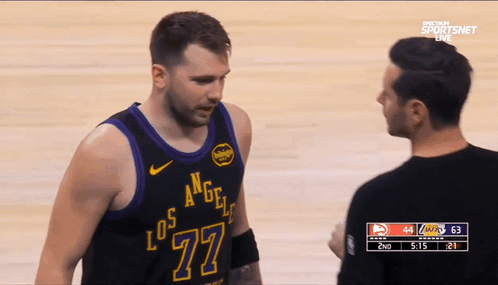 A Basketball Player With The Number 77 On His Jersey GIF