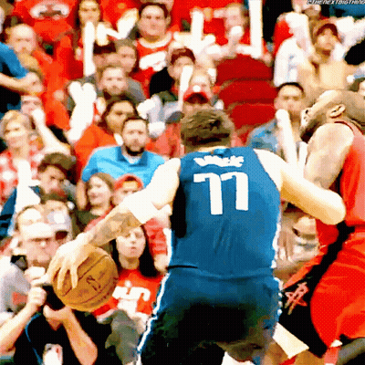 A Basketball Player With The Number 77 On The Back Of His Shirt GIF