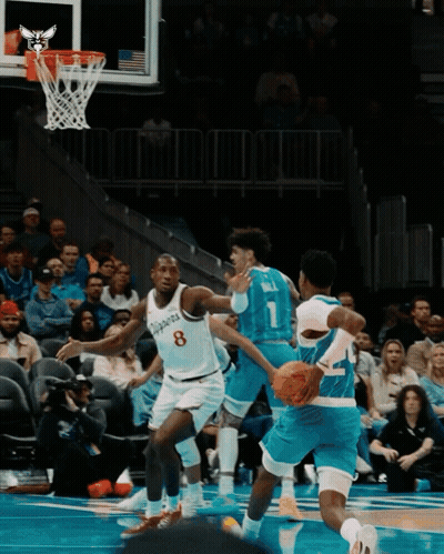 A Basketball Player With The Number 8 On The Back Of His Shirt GIF