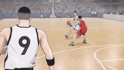 A Basketball Player With The Number 9 On His Jersey Dribbles The Ball GIF