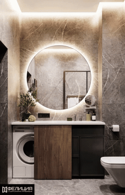 A Bathroom With A Round Mirror And A Washer GIF