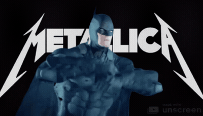 A Batman Standing In Front Of A Metallica Sign GIF