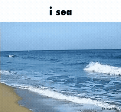 A Beach With The Words I Sea Above It GIF