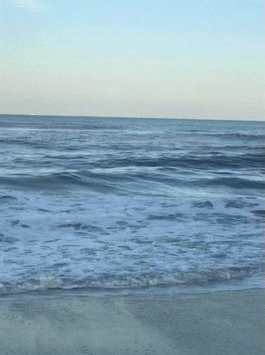 Beach With Waves And Blue Sky GIF