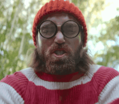 A Bearded Man Wearing Glasses And A Red Hat GIF