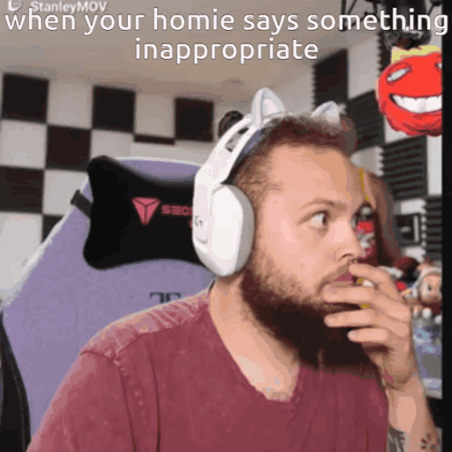 A Bearded Man Wearing Headphones With A Cat Ear Headband Says Something Inappropriate GIF