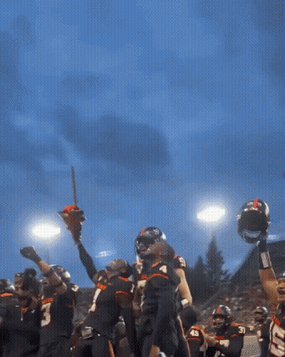 A Beaver Football Player Holds Up A Chainsaw In His Hands GIF