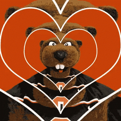 A Beaver Wearing A Cape Is Surrounded By A Heart With The Letter N On It GIF