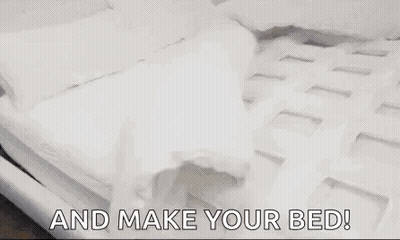 A Bedroom With A Bed And The Words `` And Make Your Bed '' Written On It . GIF