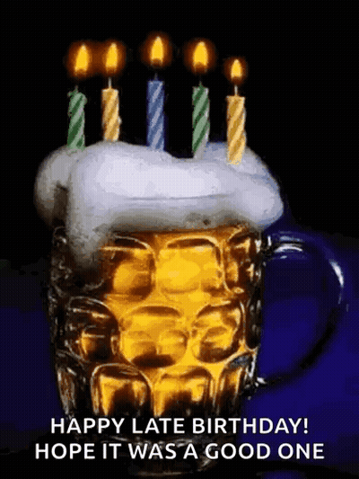 A Beer Mug With Candles On Top Of It . GIF