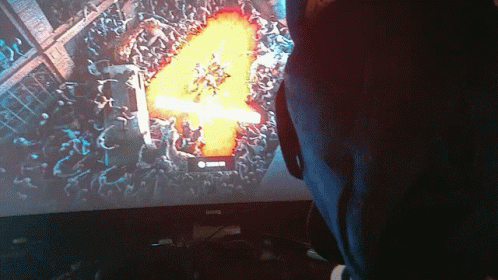 A Benq Computer Monitor Shows A Video Game GIF