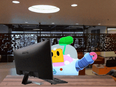 A Benq Computer Monitor With A Cartoon Character Behind It GIF