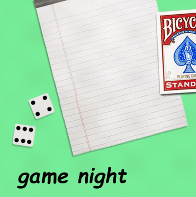 A Bicycle Playing Card Is On A Piece Of Paper Next To Dice GIF