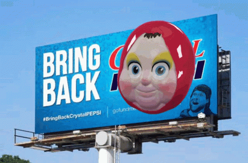 A Billboard That Says Bring Back Crystal Pepsi With A Cartoon Face On It GIF