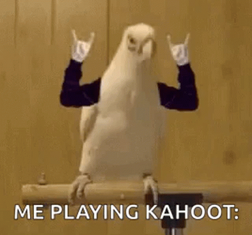 A Bird Is Making A Devil Horns Sign With Its Arms While Sitting On A Branch . GIF