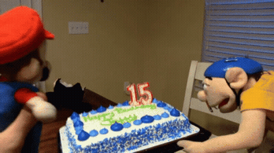 A Birthday Cake With A Candle That Says 15 GIF